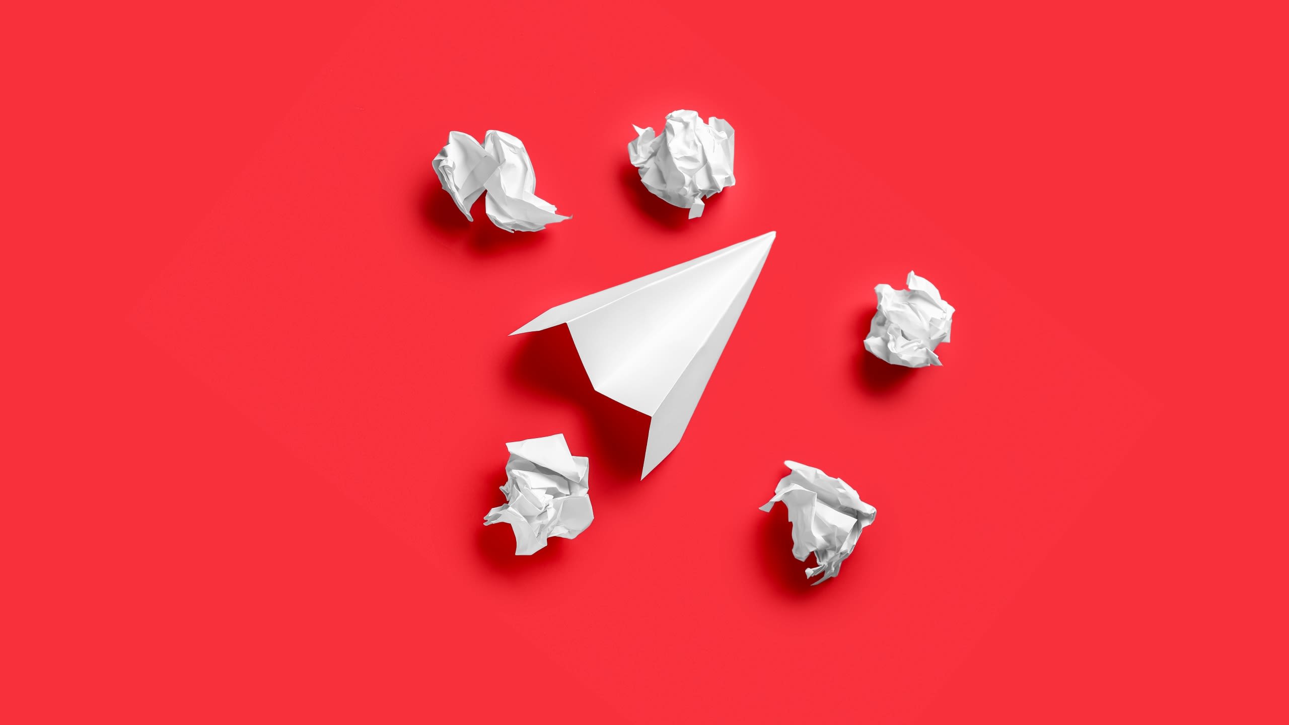 white paper on yellow background